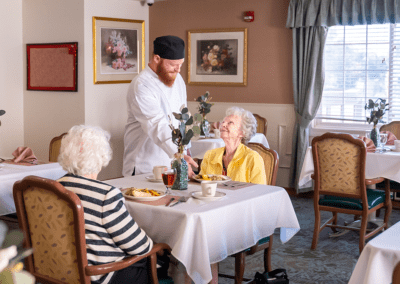 Resident being served food